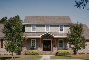 Home With Architectural Asphalt Shingles & Standing Seam Metal Roofing | Mixed Material Roofing | Bulloch County Residential Roofing | Statesboro Residential Roofers