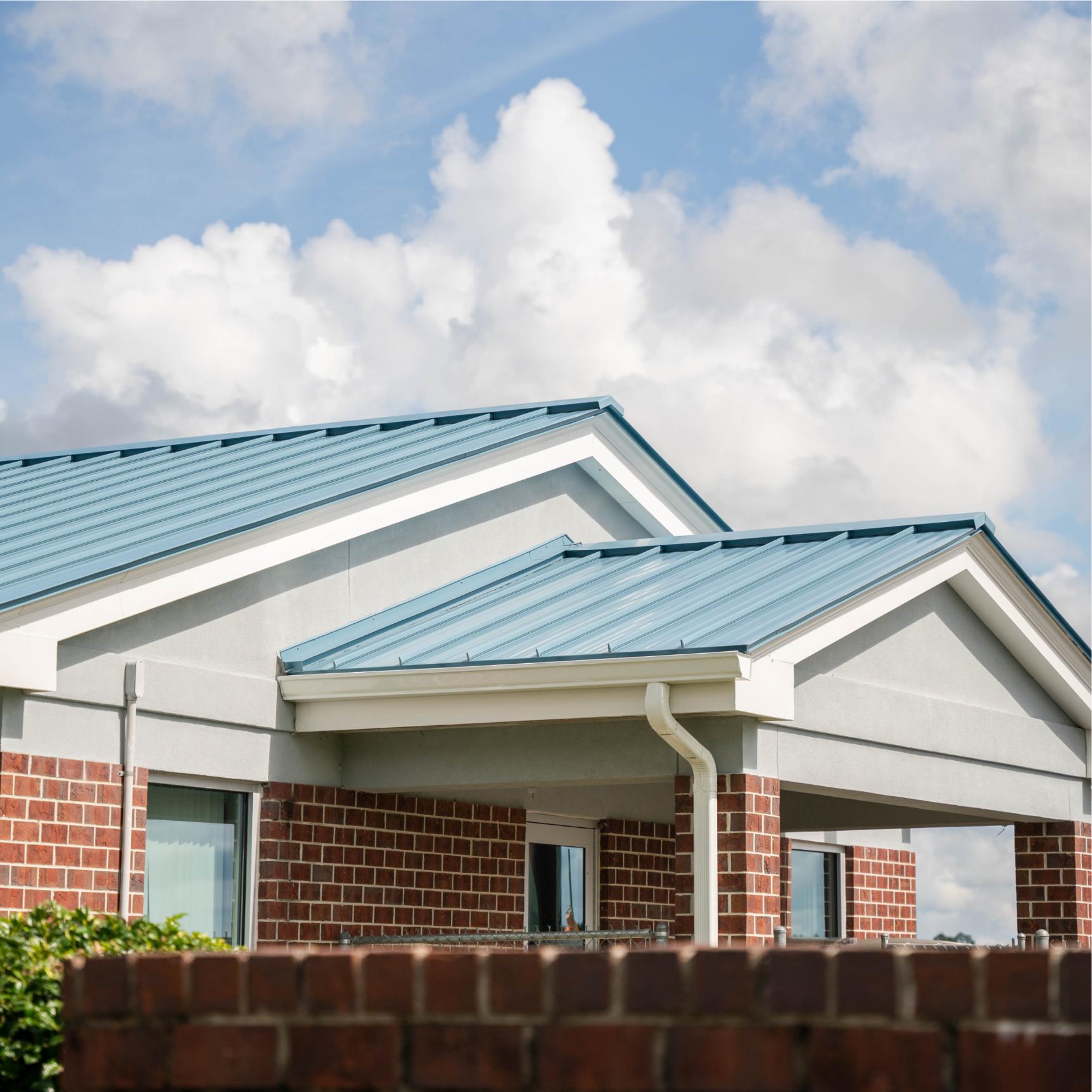 Statesboro-Bulloch County Airport | Commercial Roof Replacement | Bulloch County Commercial Roofers | Standing Seam Metal Roofing | Blue Roof | Commercial Metal Roof