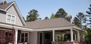 Home With Architectural Asphalt Shingles & Standing Seam Metal Roofing | Mixed Material Roofing | Bulloch County Residential Roofing | Statesboro Residential Roofers