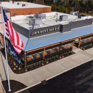 Jim 'n Nicks BBQ Restaurant Roof | Flat Roofing | Low Slope Roofing | Metal Roofing | Commercial Standing Seam Metal Roof | Commercial Roofing Solutions | Bulloch County Commercial Roofers | New Construction Commercial Roofer