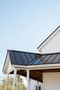 Statesboro Pathology Associates | Commercial Roofing Project After | Onyx Black Architectural Asphalt Shingles | Matte Black Standing Seam Metal Roofing