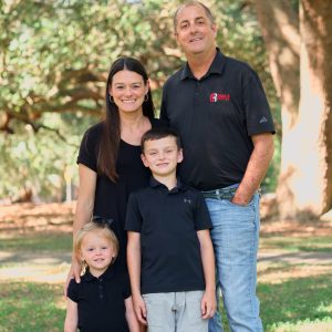 Clay Chandler | President, CEO. Clay Chandler with his wife and two young children.